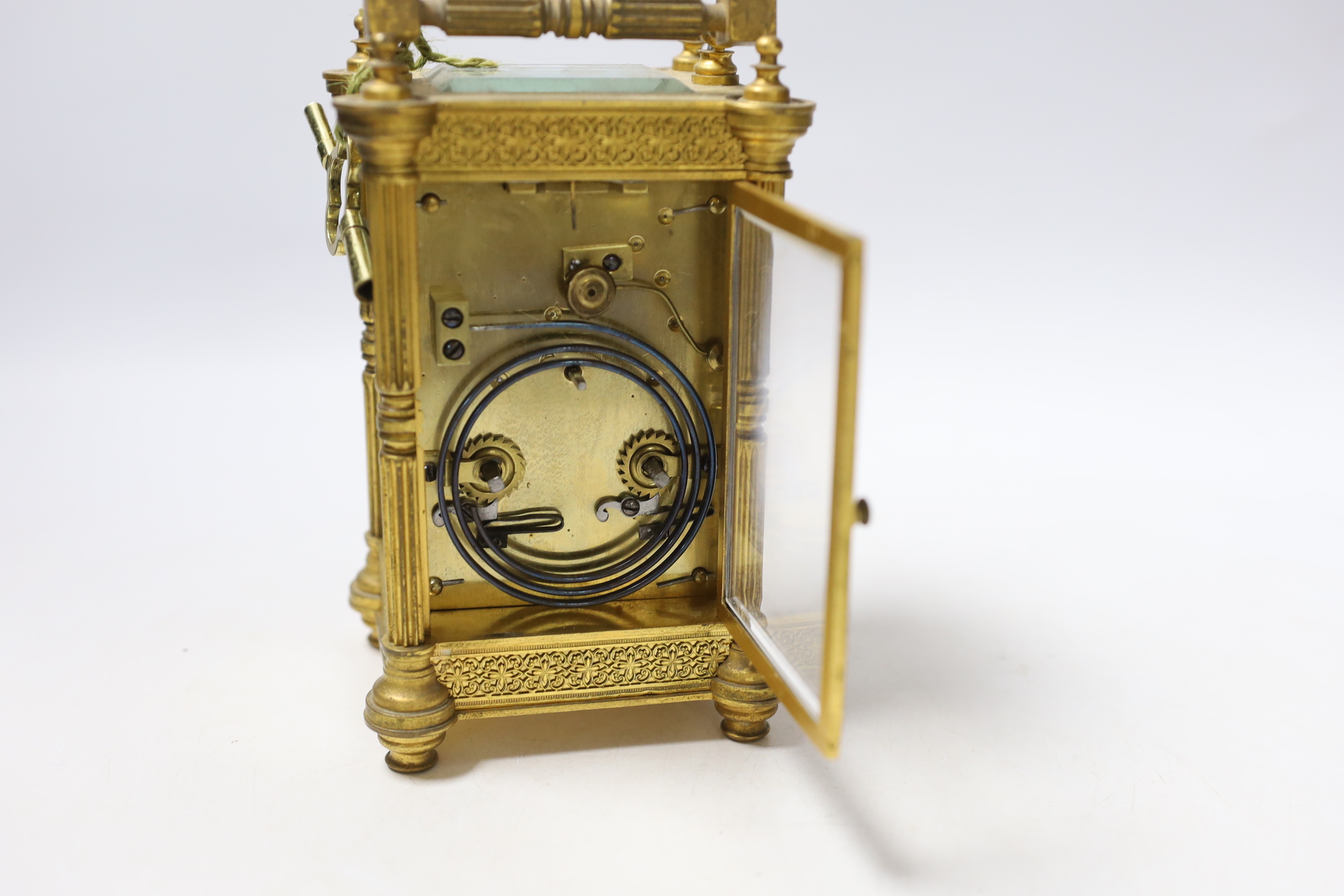 An Edwardian carriage timepiece with blind fretwork decoration, 16.5cm